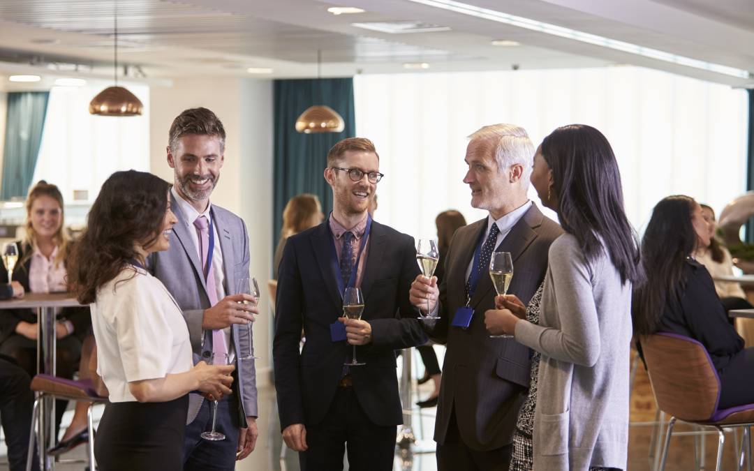 Business owners following networking etiquette